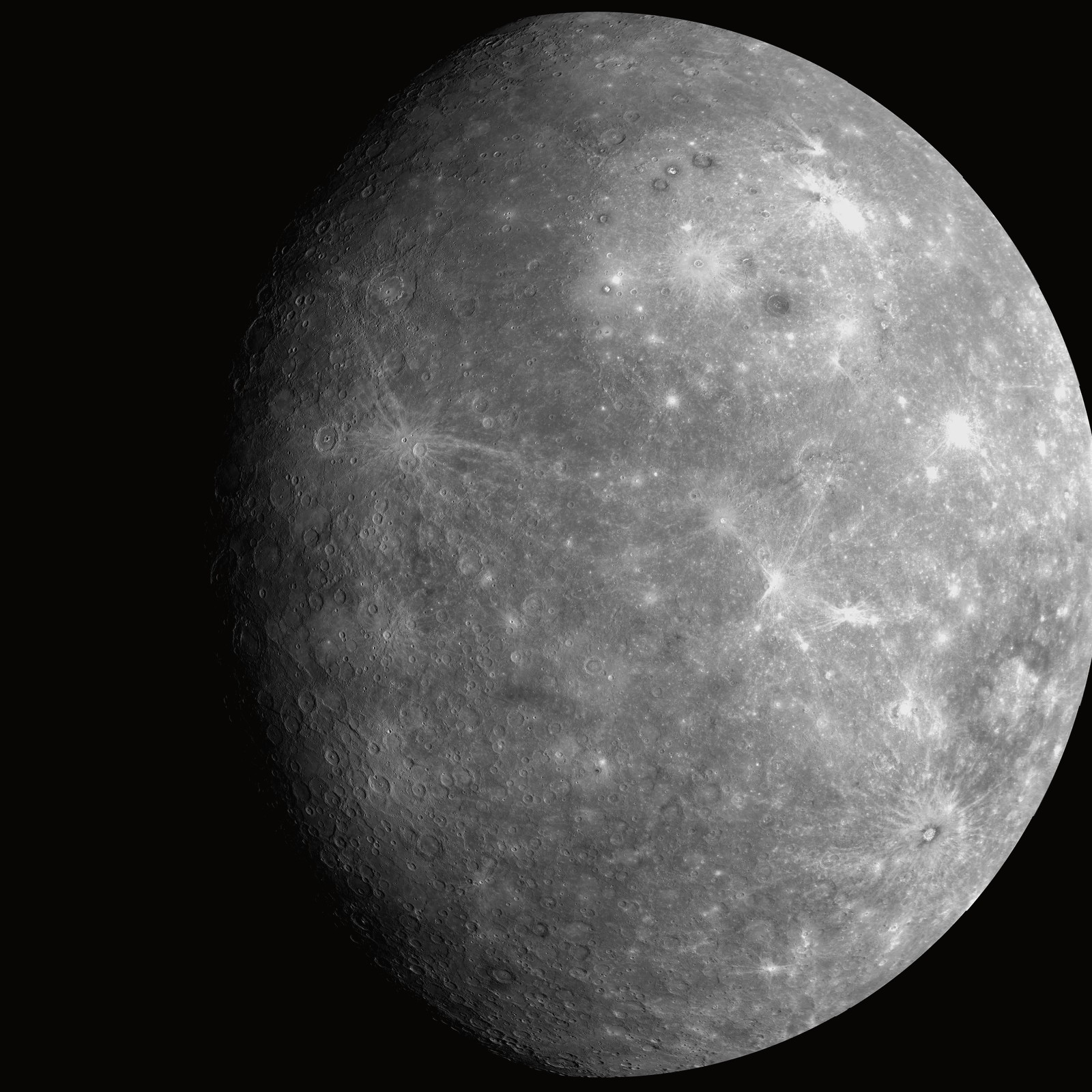 Mercury after MESSENGER’s first flyby: a cratered, sunlit disk dissolving into night.
